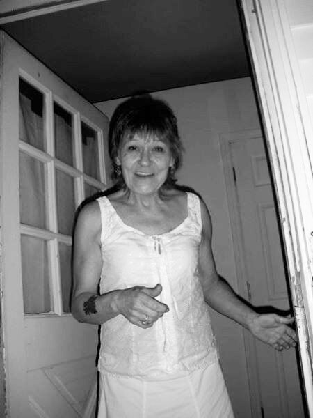 Her Nightgown Sweeps The Pavement